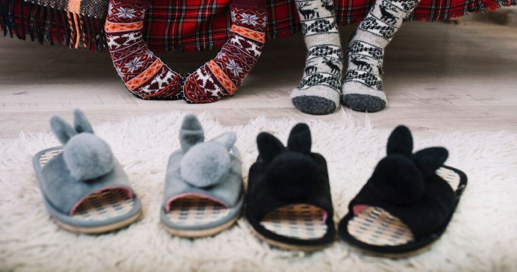 cozy-house-slippers-floor-near-human-legs