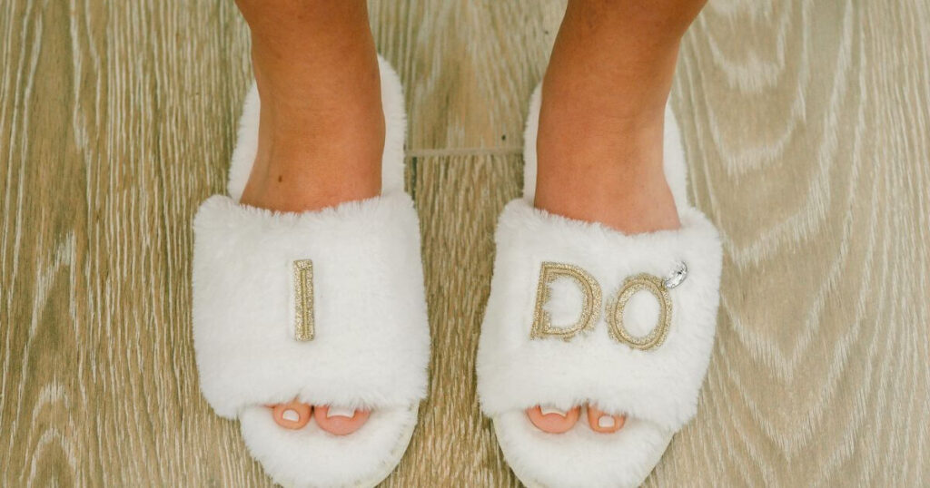 feet-of-a-woman-wearing-cozy-furry-white-slippers